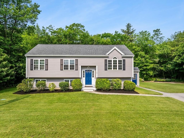 33 Beaver St, Whitman, MA 02382 - raised ranch featuring a front yard