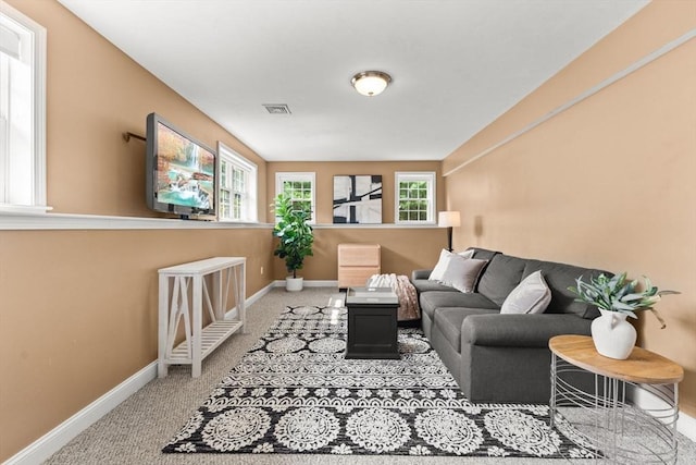 33 Beaver St, Whitman, MA 02382 - living area featuring healthy amount of natural light, baseboards, and light colored carpet