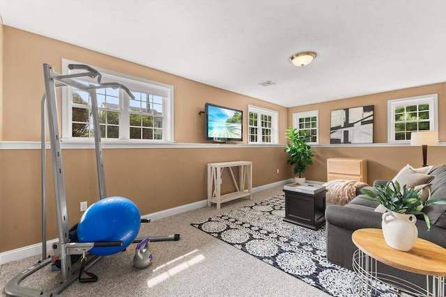 33 Beaver St, Whitman, MA 02382 - carpeted living room featuring healthy amount of natural light and baseboards