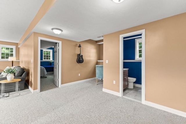33 Beaver St, Whitman, MA 02382 - bedroom featuring carpet flooring, baseboards, multiple windows, and connected bathroom