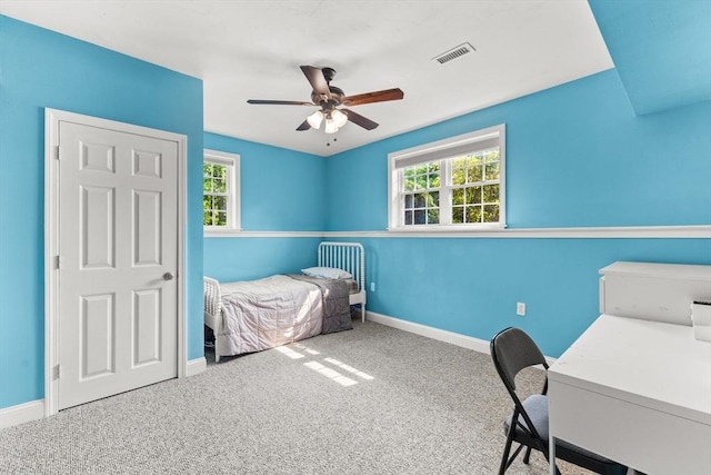 33 Beaver St, Whitman, MA 02382 - carpeted bedroom with multiple windows, baseboards, and a ceiling fan