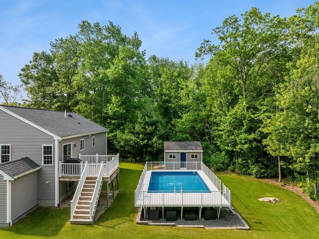 33 Beaver St, Whitman, MA 02382 - swimming pool with a wooden deck, an outbuilding, a lawn, and stairway