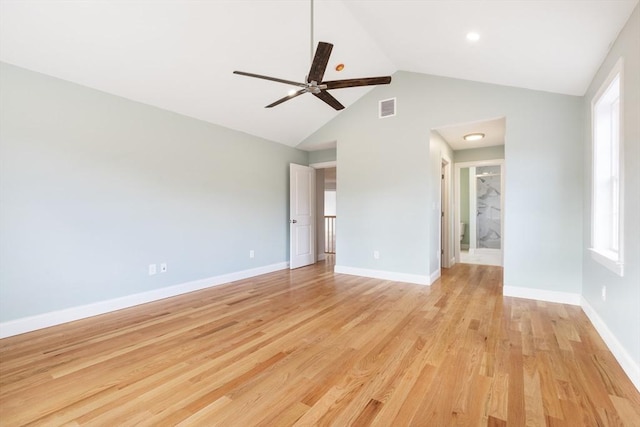 interior space featuring ceiling fan, light hardwood / wood-style floors, and high vaulted ceiling