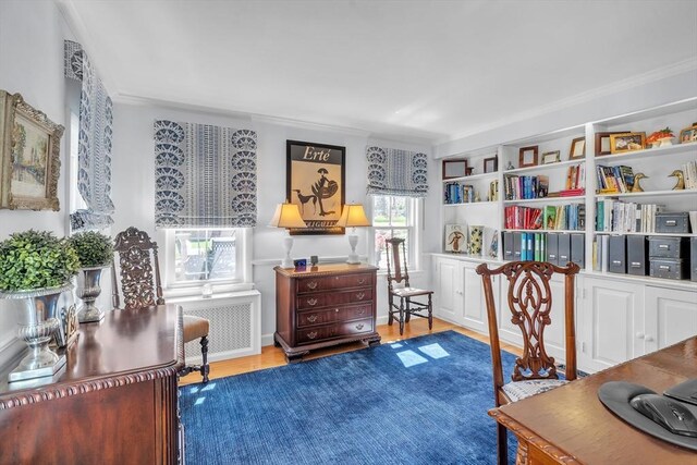 40 Pleasant St, Dover, MA 02030 - interior space with wood finished floors, ornamental molding, and radiator heating unit