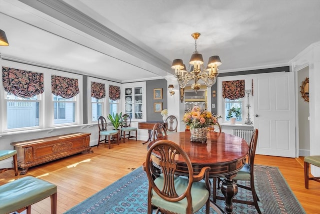 40 Pleasant St, Dover, MA 02030 - dining room with baseboards, ornamental molding, wood finished floors, and a chandelier