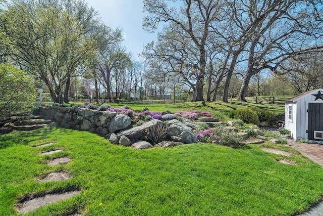 40 Pleasant St, Dover, MA 02030 - view of yard with a storage shed and an outbuilding
