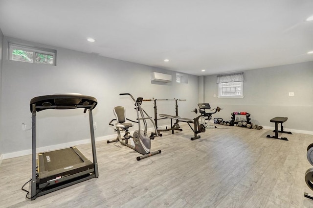 13 Tamarack Rd, Medfield, MA 02052 - exercise area featuring a wall mounted AC, wood finished floors, and recessed lighting