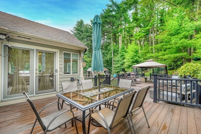 13 Tamarack Rd, Medfield, MA 02052 - deck featuring outdoor dining space and a gazebo
