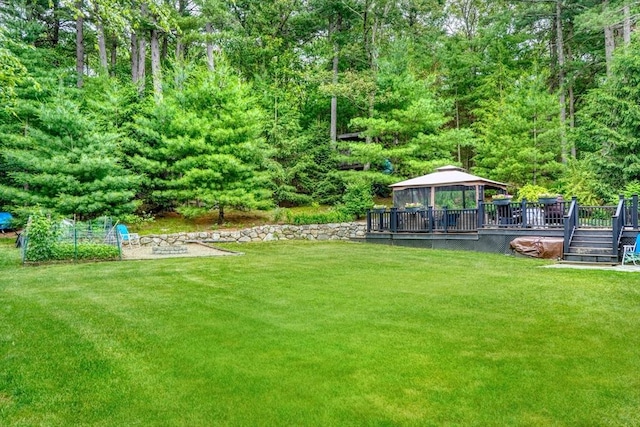13 Tamarack Rd, Medfield, MA 02052 - view of grassy yard with a gazebo, a deck, and a wooded view