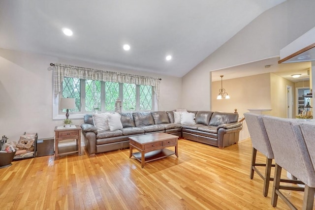 13 Tamarack Rd, Medfield, MA 02052 - living area featuring light wood-style flooring, high vaulted ceiling, recessed lighting, and a chandelier