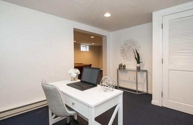 home office featuring recessed lighting, a baseboard heating unit, and dark carpet