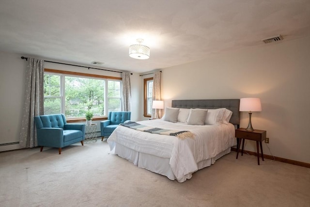 bedroom featuring carpet floors, baseboards, visible vents, and baseboard heating