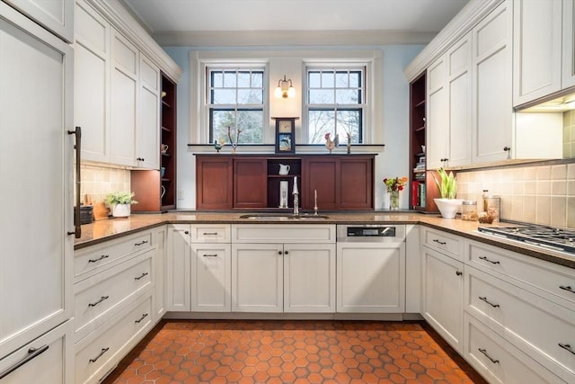 kitchen with a sink, white cabinetry, stainless steel gas cooktop, open shelves, and backsplash