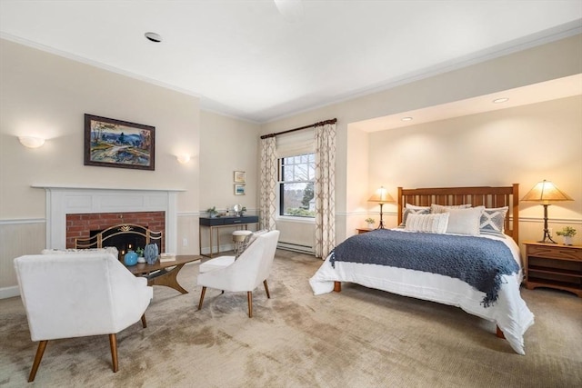 bedroom featuring carpet floors, a brick fireplace, crown molding, and baseboard heating