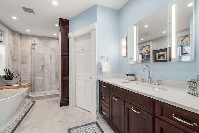 full bath with marble finish floor, recessed lighting, visible vents, a freestanding bath, and a stall shower