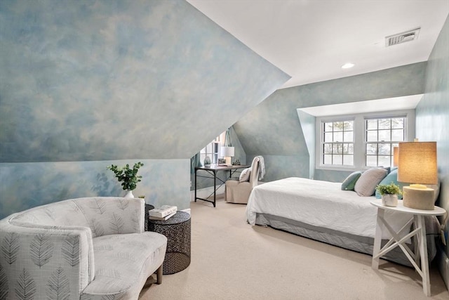 bedroom featuring carpet, visible vents, and vaulted ceiling