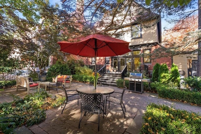 view of patio featuring outdoor dining area, outdoor lounge area, and a grill