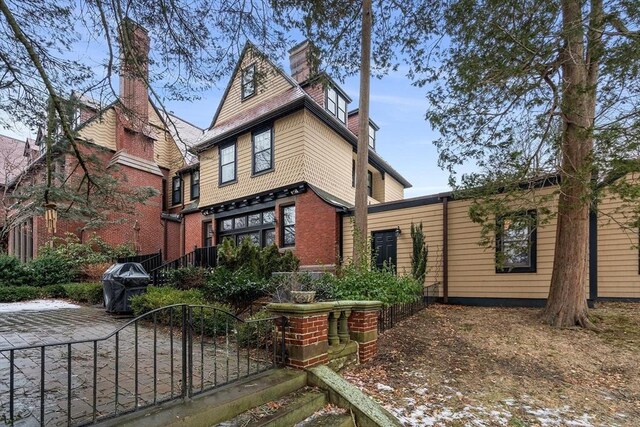 view of front of property with brick siding