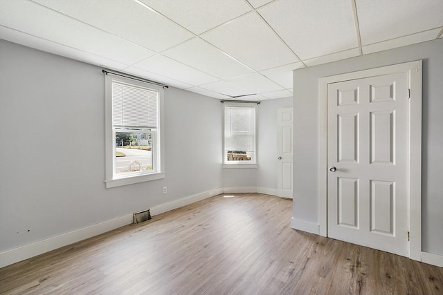 436 Maple St, Winchendon, MA 01475 - unfurnished bedroom with wood finished floors and a paneled ceiling