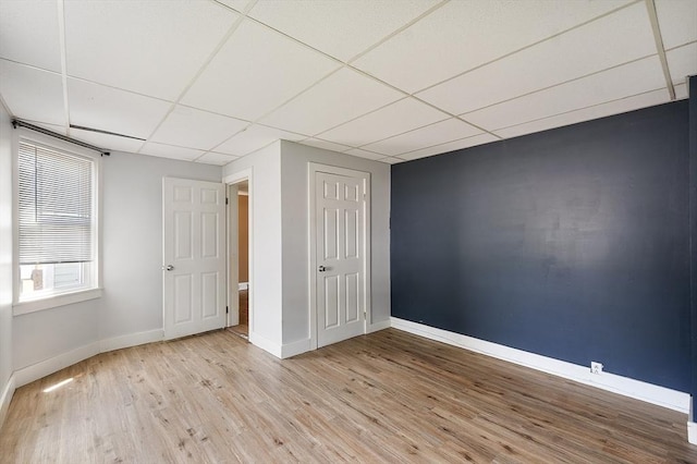 436 Maple St, Winchendon, MA 01475 - unfurnished bedroom with a drop ceiling and wood finished floors