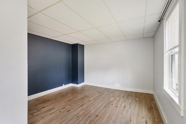 436 Maple St, Winchendon, MA 01475 - empty room featuring wood finished floors and a drop ceiling