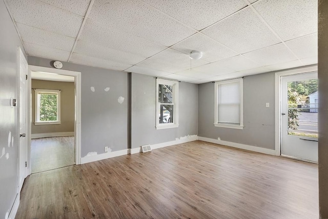 436 Maple St, Winchendon, MA 01475 - unfurnished room featuring a drop ceiling, light wood finished floors, and a smoke detector