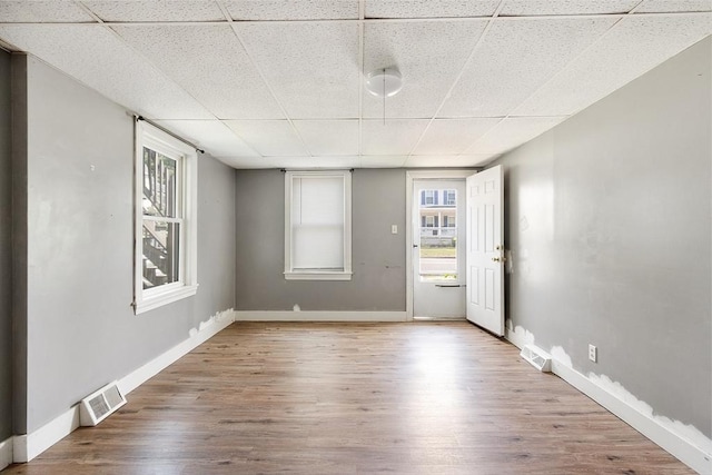 436 Maple St, Winchendon, MA 01475 - unfurnished room featuring a drop ceiling, wood finished floors, and healthy amount of natural light