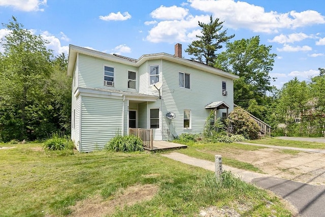 436 Maple St, Winchendon, MA 01475 - view of front of home with a chimney, a front lawn, and a deck