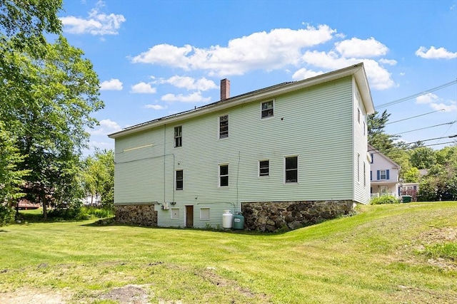 436 Maple St, Winchendon, MA 01475 - back of property featuring a chimney and a lawn