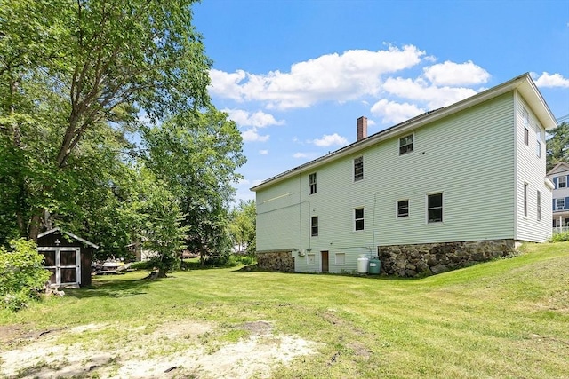 436 Maple St, Winchendon, MA 01475 - back of house featuring a chimney and a yard