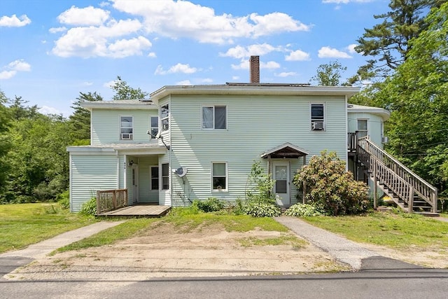436 Maple St, Winchendon, MA 01475 - view of front facade featuring a chimney, a deck, and stairway