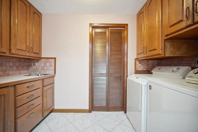 51 S St, Granby, MA 01033 - washroom featuring independent washer and dryer, cabinet space, and baseboards