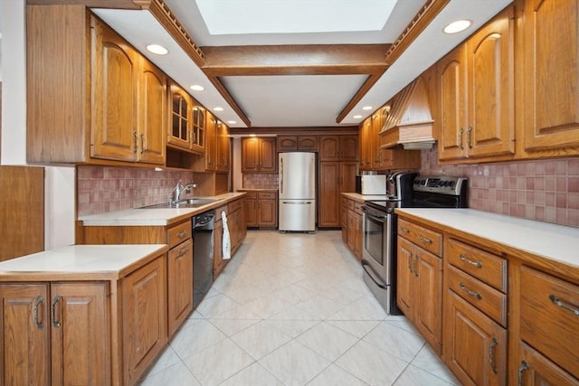 51 S St, Granby, MA 01033 - kitchen featuring stainless steel appliances, custom range hood, brown cabinetry, and recessed lighting