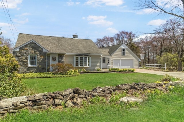 51 S St, Granby, MA 01033 - view of front facade featuring driveway, a chimney, a garage, a front yard, and stone siding