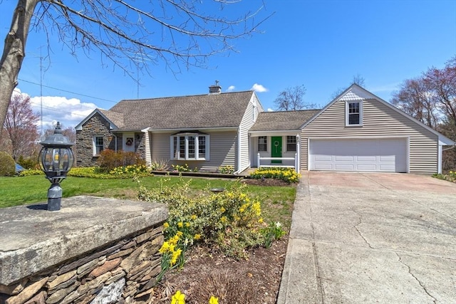 51 S St, Granby, MA 01033 - view of front facade featuring a garage, a shingled roof, concrete driveway, a front lawn, and stone siding