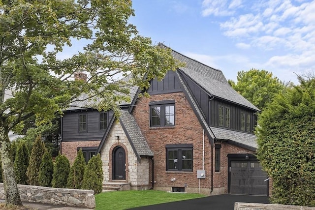 tudor house with a garage