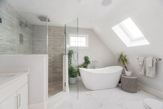 full bathroom featuring vaulted ceiling, toilet, separate shower and tub, and vanity