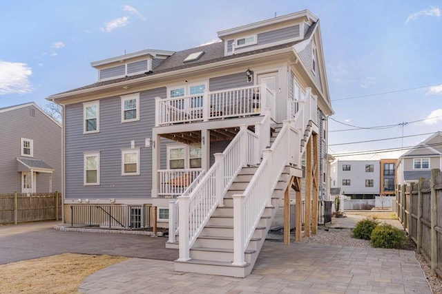 rear view of house featuring a patio area