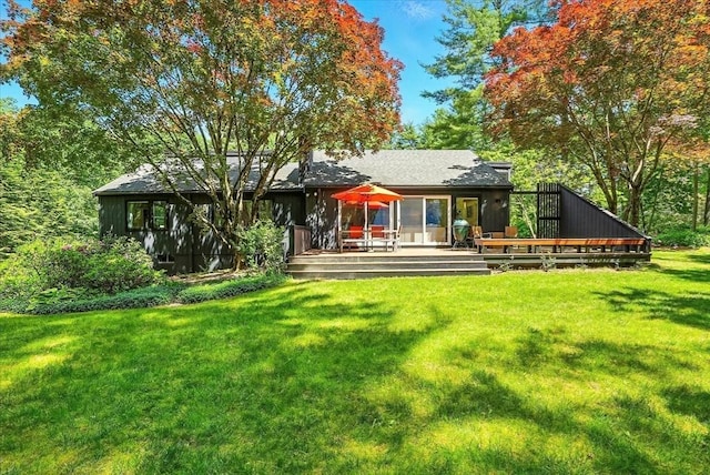 13 Robinwood Rd, Acton, MA 01720 - rear view of house with a wooden deck and a lawn