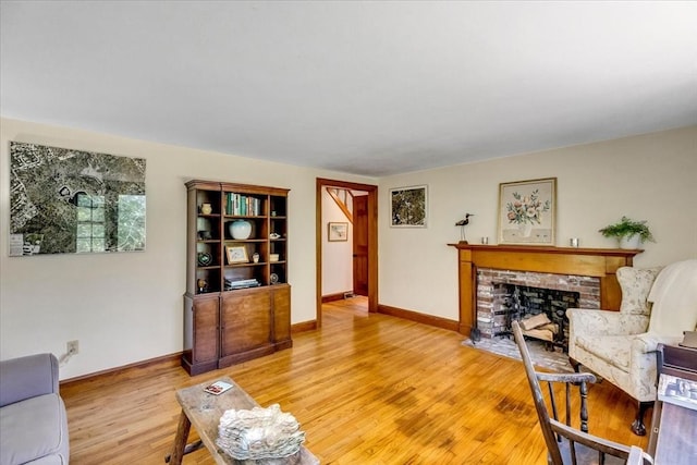 3 Five Cors, Barnstable, MA 02632 - living area featuring light wood-type flooring and a brick fireplace