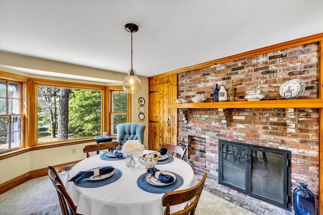 3 Five Cors, Barnstable, MA 02632 - dining space featuring healthy amount of natural light and a brick fireplace