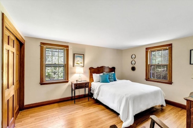 3 Five Cors, Barnstable, MA 02632 - bedroom with light wood-style floors, multiple windows, and a closet