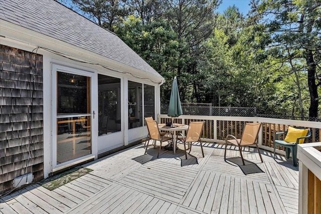 3 Five Cors, Barnstable, MA 02632 - deck featuring outdoor dining space, view of scattered trees, and a sunroom
