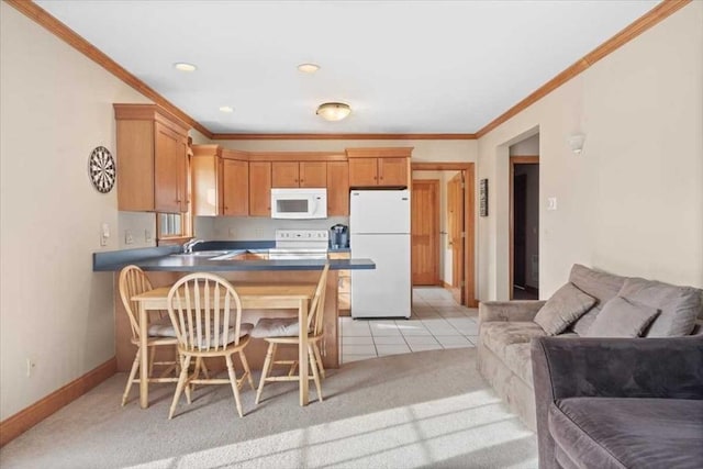 kitchen featuring light carpet, crown molding, kitchen peninsula, and white appliances