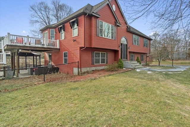 view of side of property with a lawn