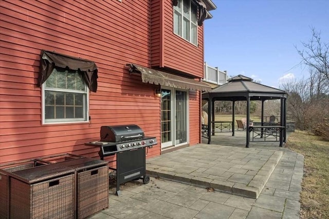 view of patio / terrace featuring a gazebo and area for grilling