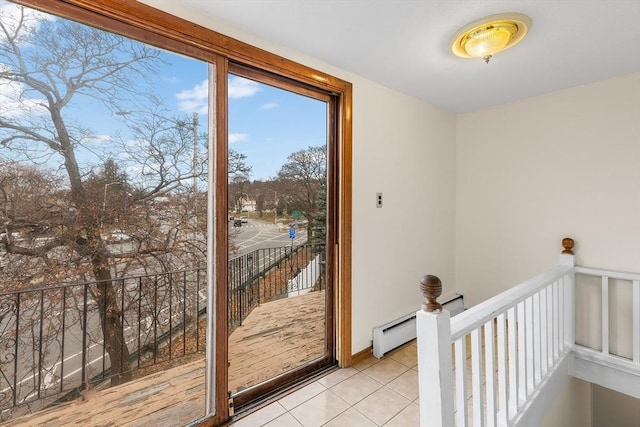 doorway to outside featuring light tile patterned floors