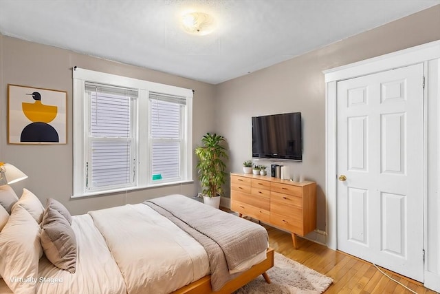 bedroom featuring light hardwood / wood-style flooring