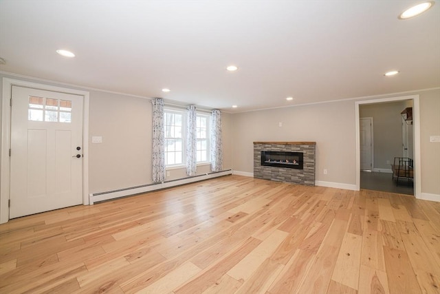 3 Woods Rd, Westminster, MA 01473 - unfurnished living room with a stone fireplace, ornamental molding, baseboard heating, and light wood-style floors