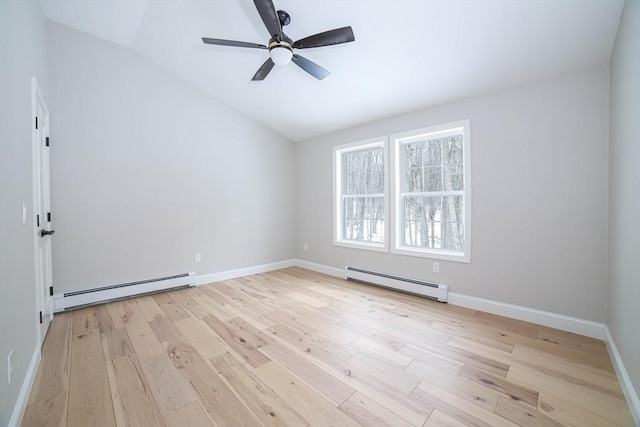 3 Woods Rd, Westminster, MA 01473 - spare room with baseboards, lofted ceiling, a baseboard radiator, wood finished floors, and a baseboard heating unit